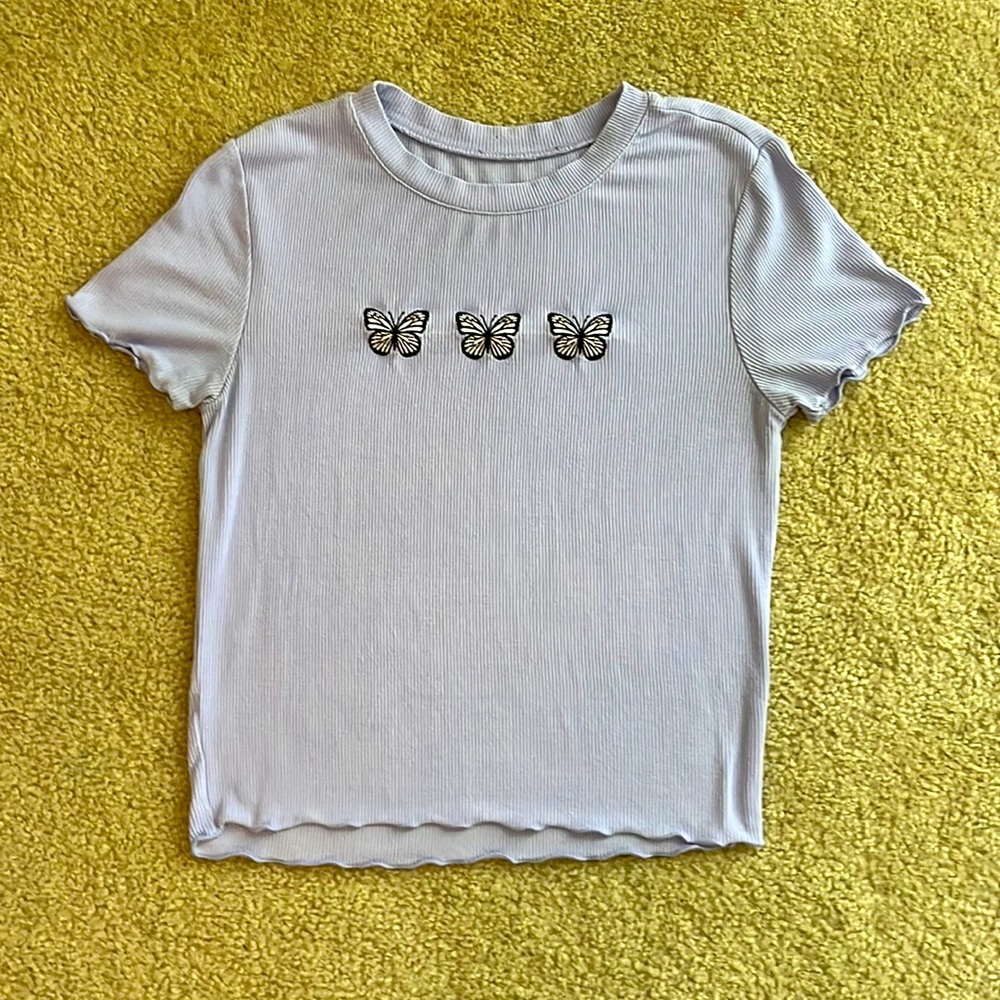 Purple shirt with butterfly design